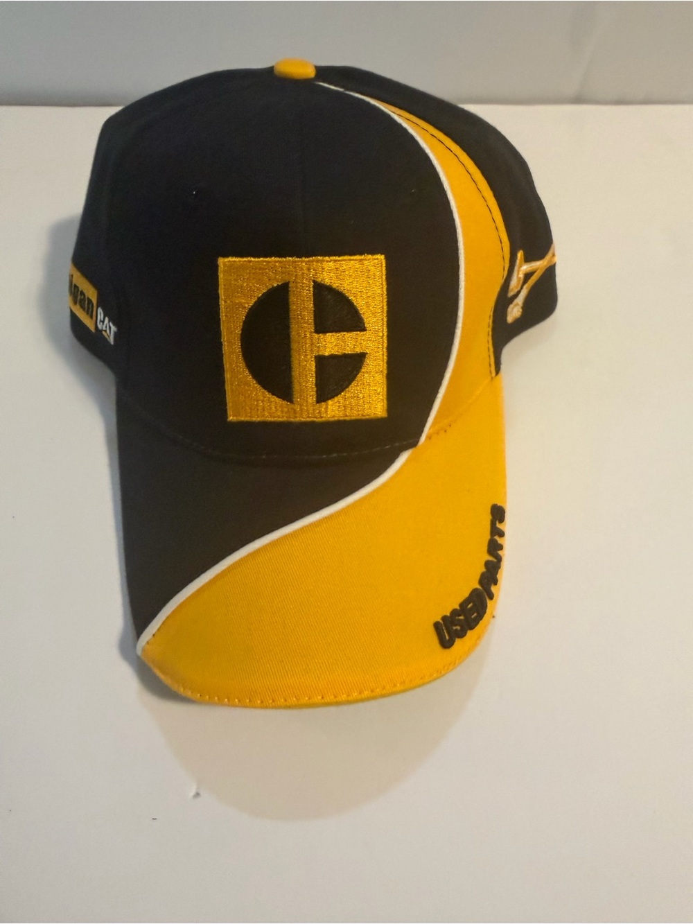 Caterpillar Black and Yellow Racing-Style Logo Cap